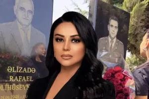 Vüsalə atasının və qardaşının məzarı önündə