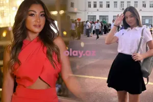 Zümrüd qızını məktəbə yola saldı