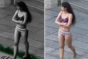 İranda tələbə qız soyunaraq aksiya keçirdi