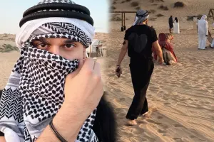 Coninin səhrada dəvə ilə gəzintisi - Video