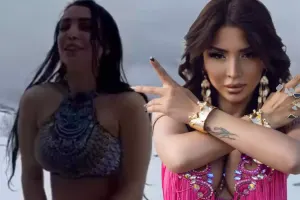 Şaxtalı havada çölə bikinidə çıxdı