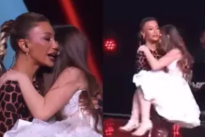 Röya iştirakçını qucağına aldı