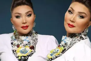 Nazpəri şokolad qutularındakı şəkillərindən pul qazanıb?