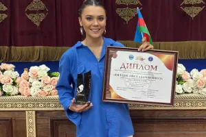 OKsana Qazaxstanda mükafat aldı