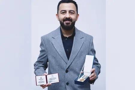 OLAY-ın baş redaktoru təltif olundu