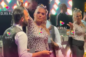 Şampanı klub işçisinin başına tökdü