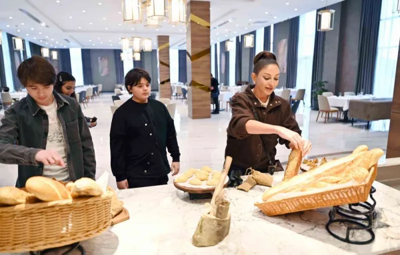 Prezident və xanımı nəvələri ilə açılışda